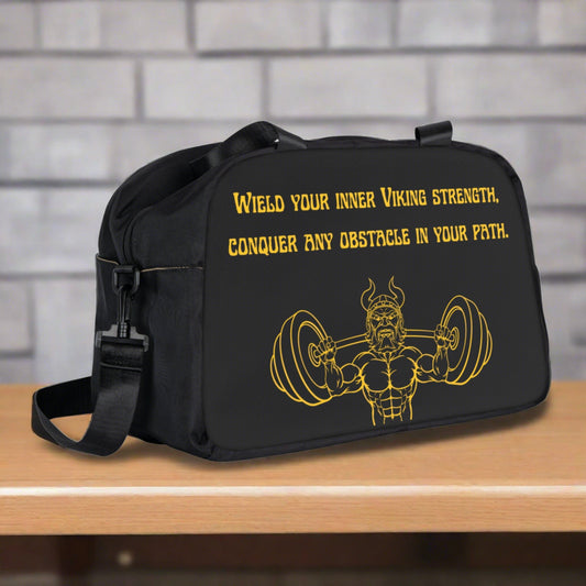 Black Duffle bag with celtic Viking quote written in yellow and sitting on a locker room bench.